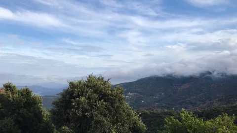 Beautiful clouds moving over the hill on a a green island Stock-Footage 82939913