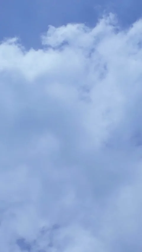 Beautiful clouds moving in sky, timelapse. Vertical video Stock Footage 303516491