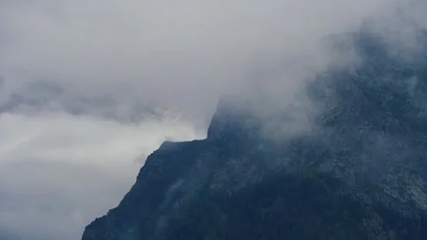 Beautiful Clouds Moving Like Waves Over Himalayan Mountains Stock Footage 316892218