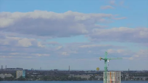 Beautiful clouds over the city time lapse. Time lapse of clouds over a big city. Stock Footage 219401225