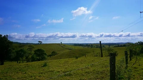 Beautiful Clouds Over the Green Field Hills Timelapse Queensland, Australia 4 Stock Footage 75460235