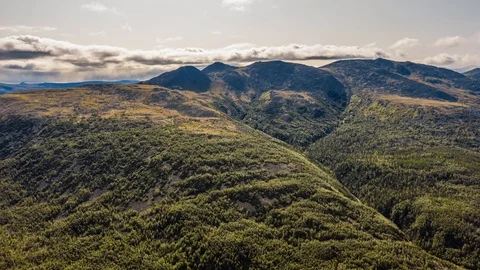 Beautiful clouds over the mountains, Ural mountains, Russia Stock Footage 119819486