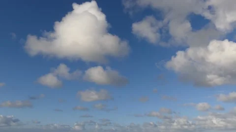 Beautiful clouds over the ocean with blue sky - time lapse Stock Footage 143598940