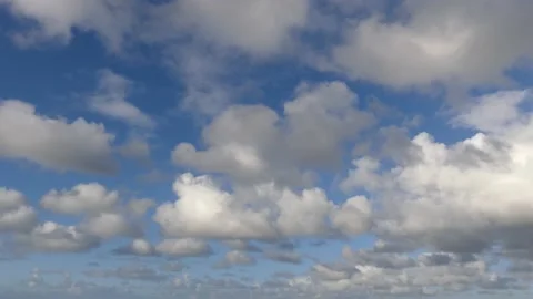Beautiful clouds over the ocean with blue sky - background - time lapse Stock Footage 143599069