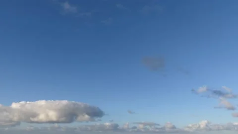 Beautiful clouds over the ocean with blue sky - background - time lapse Stock Footage 143600461