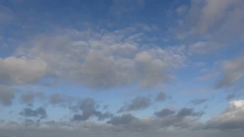 Beautiful clouds over the ocean with blue sky - background - time lapse Stock Footage 144178576