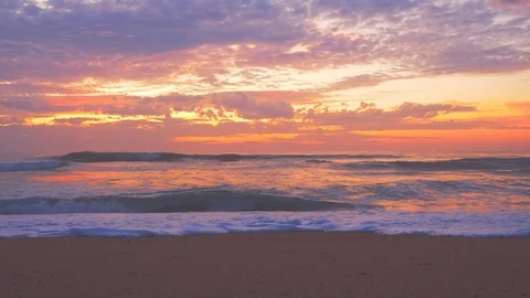 Beautiful clouds over the sea at sunset Stock Footage 121106356