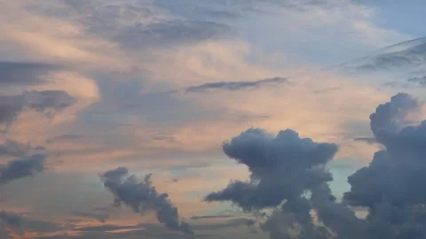 Beautiful clouds in the rays of setting sun after the rain Stock Footage 281649158