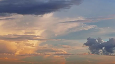 Beautiful clouds in the rays of setting sun after the rain Stock Footage 283003602