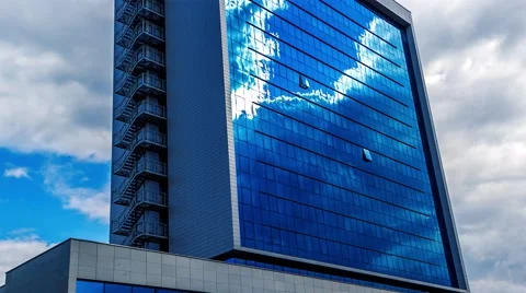 Beautiful clouds reflected in the building Stock Footage 51822647