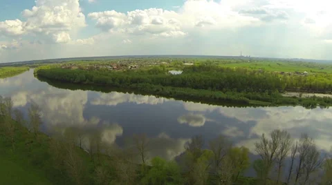 Beautiful clouds reflected in the river. Aerial view. Stock Footage 37396182