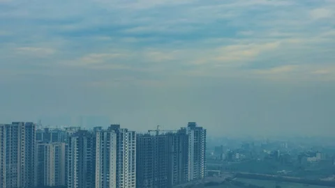 Beautiful Clouds Rolling Over City Skyline. 4K Timelapse. Stock Footage 103980204