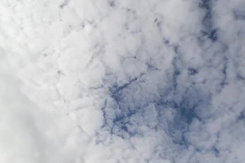 Beautiful clouds in the sky. The cumulus clouds are high in the air. Stock Photos
