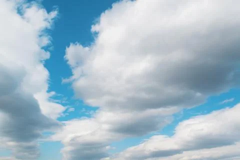 Beautiful clouds in the sky. The cumulus clouds are high in the air. Stock Photos