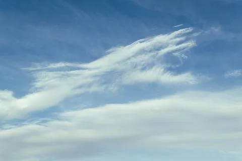 Beautiful clouds in the sky. The cumulus clouds are high in the air. Stock Photos