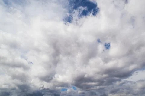 Beautiful clouds in the sky. The cumulus clouds are high in the air. Stock Photos