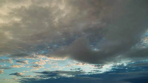Beautiful clouds in the sky at dusk at sunset. View of the cloudy sky. Video stock 279488626