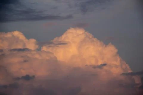 Beautiful clouds in the sky.  Pattern from clouds. Dramatic view Stock Photos