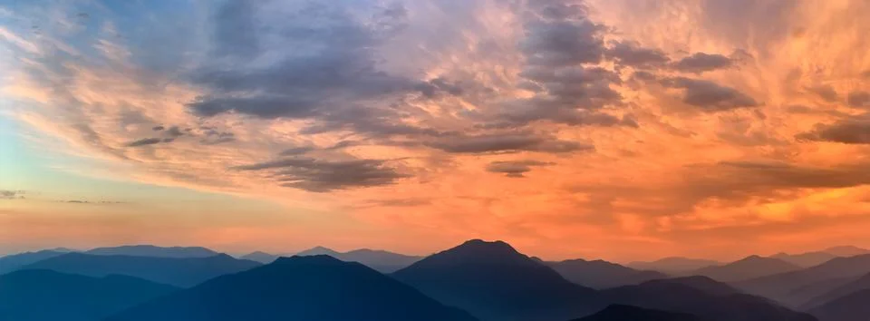 Beautiful clouds in the sky at sunset dramatic landscape Stock-Fotos