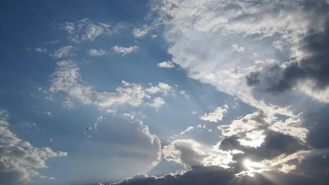 Beautiful clouds in sky. Volumetric light cumulus effect. The sunrays are hidden Stock Footage 277293810