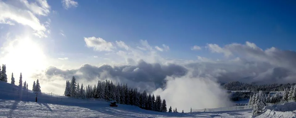 Beautiful clouds in the snow Stock Photos