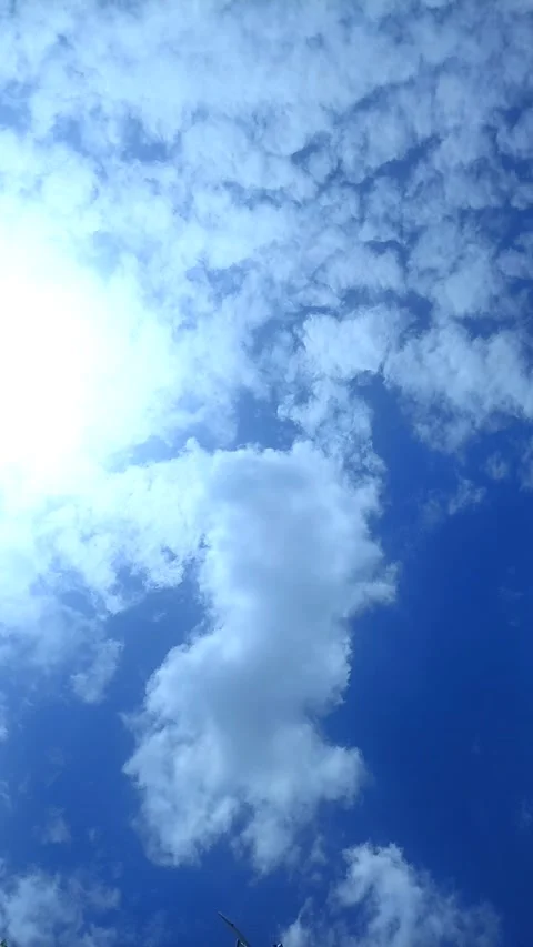 Beautiful Clouds with Sunlight,  Vertical Stock Footage 296882641