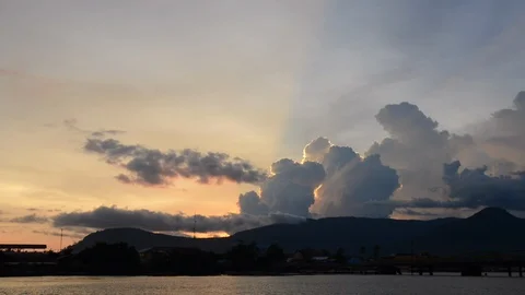 Beautiful clouds at the sunset in Kampot Stock Footage 99683217