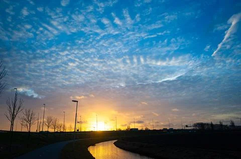 Beautiful clouds at sunset Stock Photos