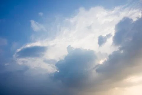 Beautiful clouds on sunset sky Stock Photos