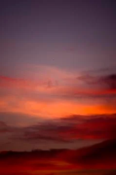 Beautiful clouds on sunset sky Stock Photos