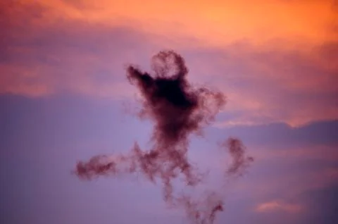 Beautiful clouds on sunset sky Stock Photos