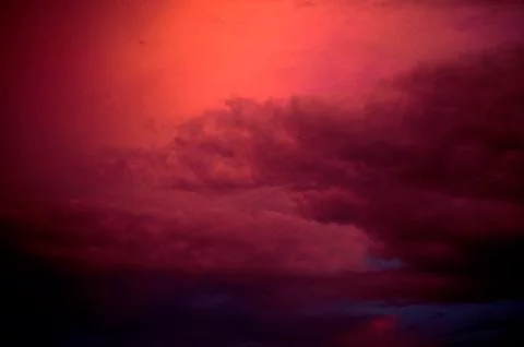 Beautiful clouds on sunset sky Stock Photos