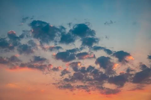 Beautiful clouds at sunset. Sunlight Stock Photos