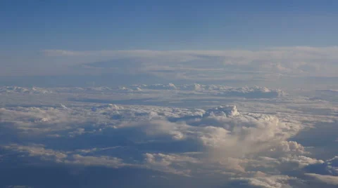 Beautiful clouds through an airplane window (RL Pan, No 5) Stock Footage 63884783