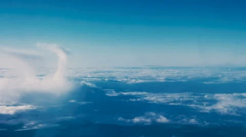 Beautiful clouds through an airplane window (LR Pan, No 1) Stock Footage 67579041