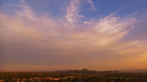 Beautiful clouds in time lapse sunrise over Phoenix, Arizona Stock Footage 73709430
