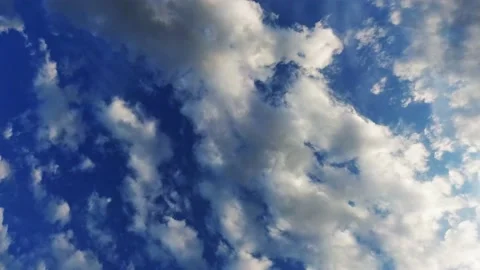 Beautiful clouds timelapse. Clouds in a blue sky Stock Footage 233115500
