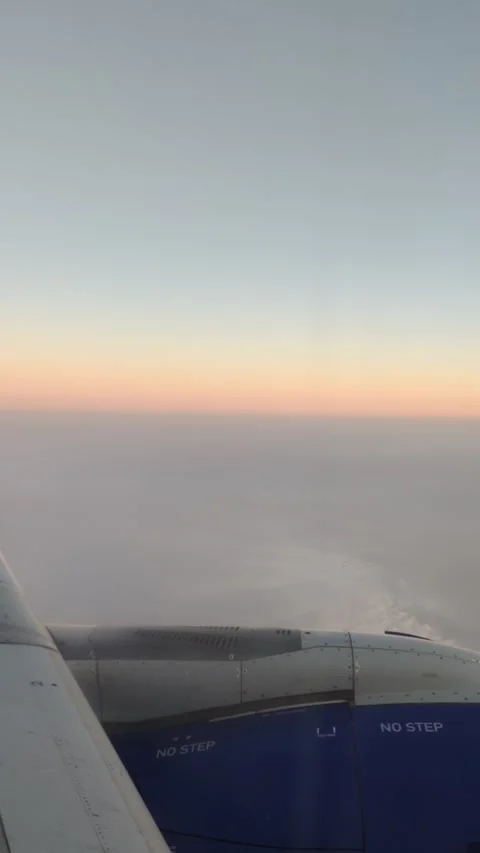 Beautiful clouds view from above the clouds from a plane window Stock Footage 142489084