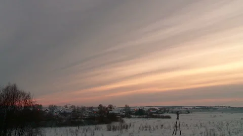 Beautiful clouds in winter over the Russian village Stock Footage 160468310