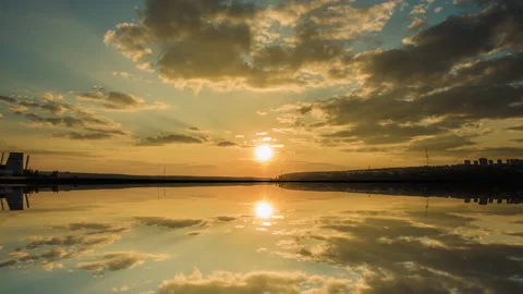 Beautiful cloudscape and sunset breaking through cloud over lake reflection. god Stock Footage 164160603