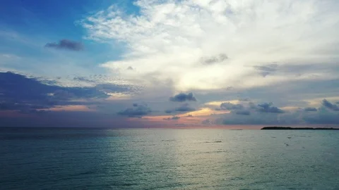 Beautiful Cloudscape And Sunset , Sun Breaking Through Cloud Over Calm Stock Footage 111254146
