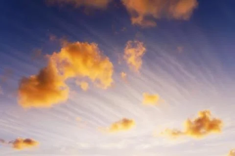 Beautiful cloudscape with cirrus clouds at sunset Stock Photos