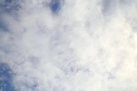 Beautiful Cloudscape with Dramatic White Clouds Against Blue Sky Stock Photos