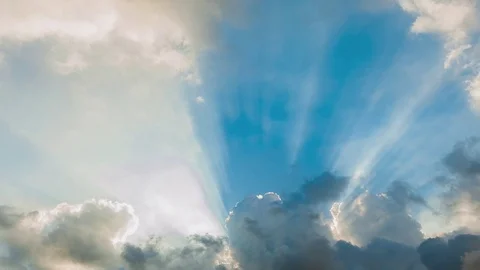 Beautiful cloudscape with large, building clouds and sunrise breaking through cl Stockbeeldmateriaal 77111289