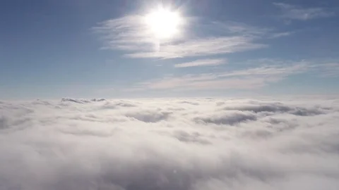 Beautiful cloudscape with large, building clouds and sunrise breaking through Vídeos de archivo 84458815