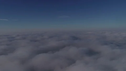 Beautiful cloudscape with large, building clouds and sunrise breaking through Vídeos de archivo 84458868