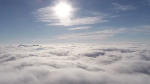 Beautiful cloudscape with large, building clouds and sunrise breaking through Vídeos de archivo 84458908