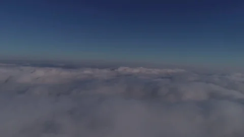 Beautiful cloudscape with large, building clouds and sunrise breaking through Vídeos de archivo 84458962