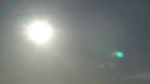 Beautiful cloudscape with large clouds and sunrise breaking through cloud mass Stock-Footage 81873027