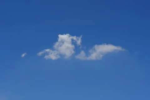 Beautiful cloudscape of nature single white cloud only one on blue sky back.. 库存照片